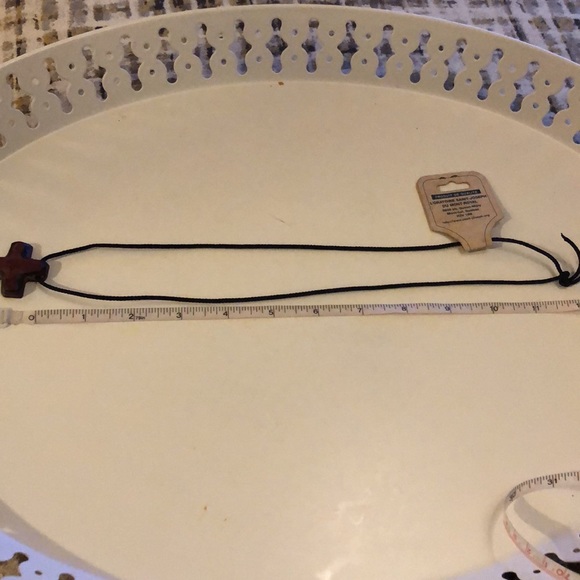 Wood look carved cross on cord - Picture 6 of 7